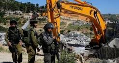 L'occupation saisit un bulldozer dans une terre au nord de la vallée du Jourdain