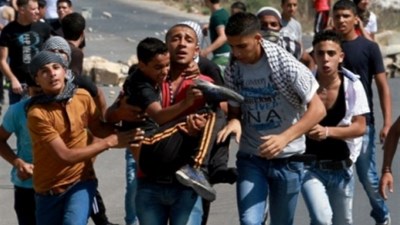 Un jeune blessé, des dizaines de cas d'asphyxie et 18 arrêtés en Cisjordanie occupée